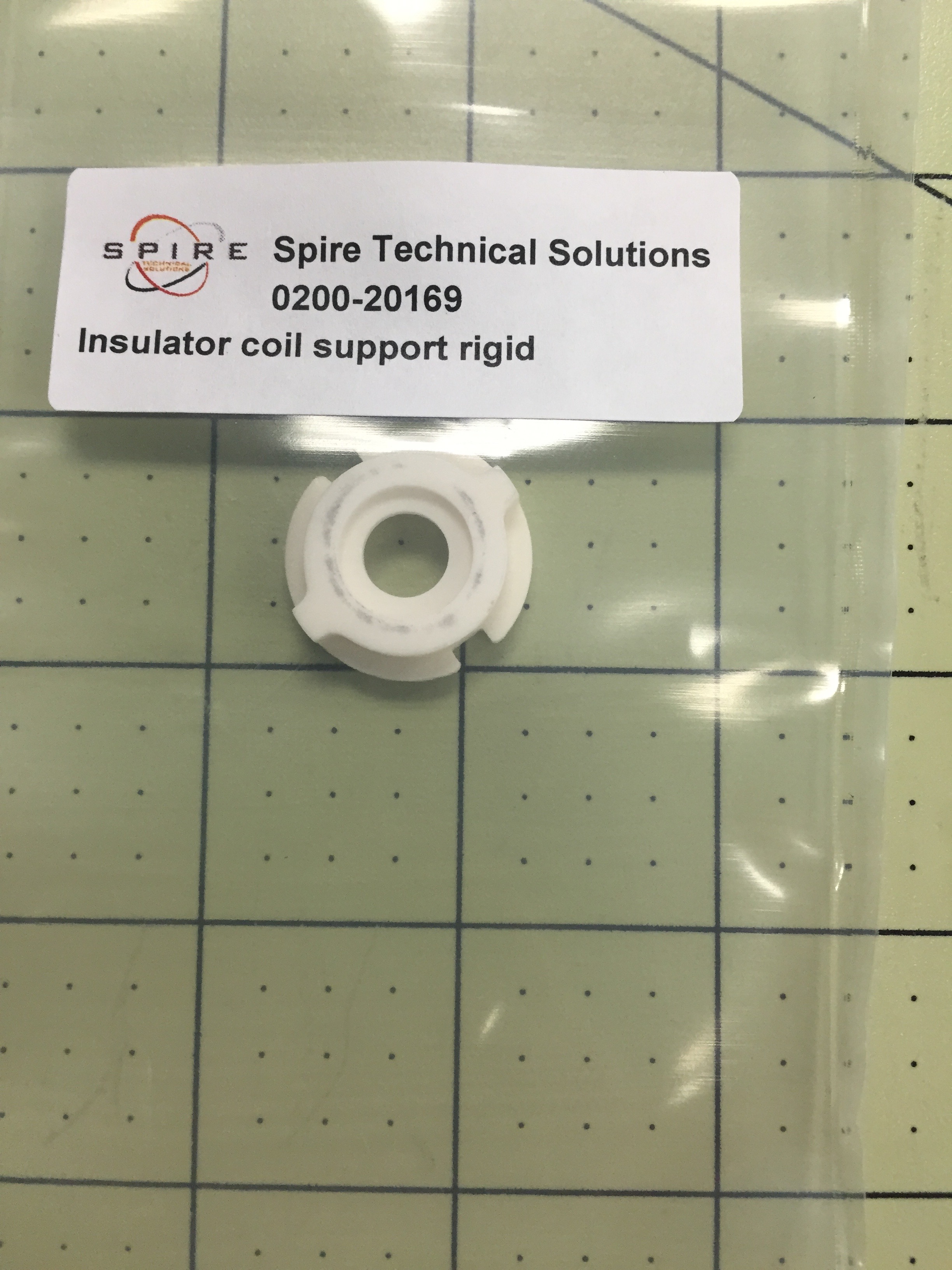 Insulator coil support rigid